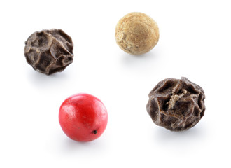 Black, red and white pepper isolated.