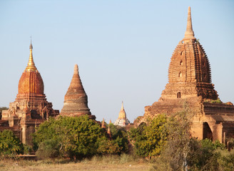 Ancient pagodas in Bagan, blue sky in background