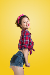 Lovely woman retro portrait  with pin-up make-up and hairstyle p