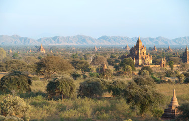 Fototapeta na wymiar Ancient pagodas in Bagan, blue sky in background