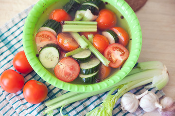 cucumbers and tomatoes with vinegar and spices.