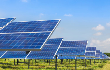 solar panels  photovoltaics in solar farm power station for alternative energy from the sun  - 128869478