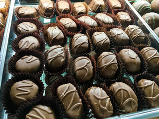 Assorted Chocolate Candies in Display Case