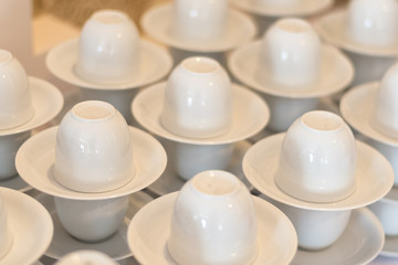 many white empty coffee cup preparation for coffee break of wedd