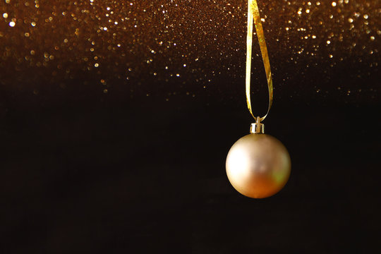 Image of christmas festive tree gold ball decoration