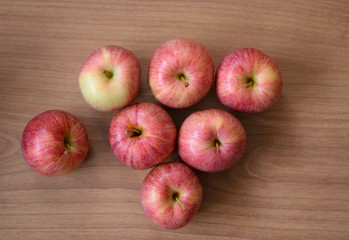 Apples on wooden background