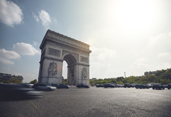 Fototapeta na wymiar Traffic around Arc de Triomphe - Paris
