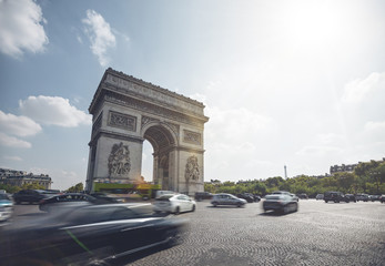 Fototapeta na wymiar Traffic around Arc de Triomphe - Paris