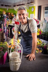 Portrait of happy male florist