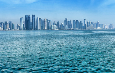 View of modern center Doha, Qatar with skyscrapers on skyline.Doha is the capital city and most populous city of the State of Qatar