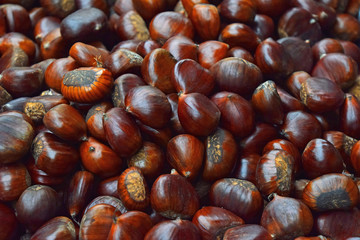 Fresh raw chestnuts (marrons) close up