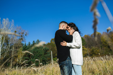 Couple in love - Beginning of a Love Story. A man and a girl on the nature while walking