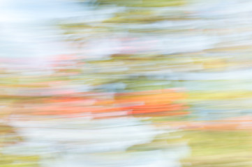 Blurred abstract background. Orange blue and green.