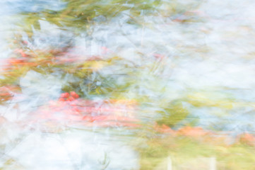 Blurred abstract background. Orange blue and green.