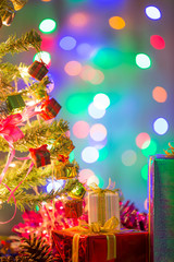 Christmas tree on blurred, sparkling and fairy background