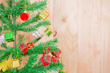 Christmas tree on wood background