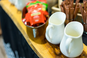 Two pitchers put on the coffee table.