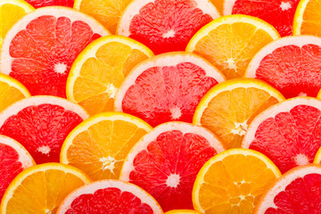 Fototapeta na wymiar Background from the oranges and grapefruits