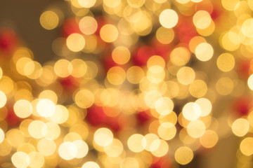 Gold mix red abstract bokeh background with defocused lights