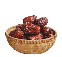 Fototapeta na wymiar Red dates or Chinese jujube in a bamboo basket on white backgruond