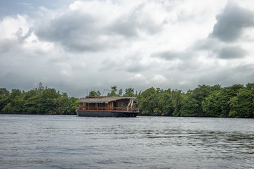 Pleasure boat on the river Bentota.