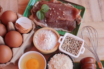 Making pork fried with breaded ( pork cutlet tonkatsu).