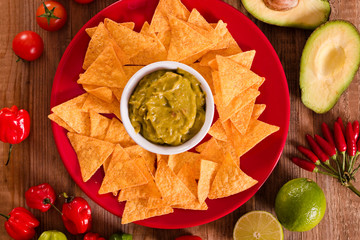Obraz na płótnie Canvas Guacamole and nacho chips.