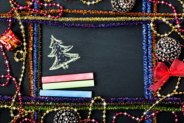 Chalk board with New Year decorations