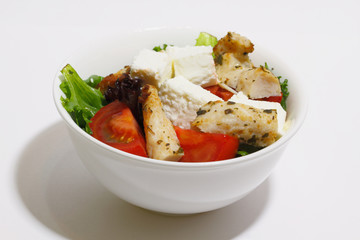 Salad with chicken fillet, tomato and feta
