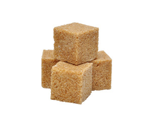 Brown cane sugar cubes isolated on white background
