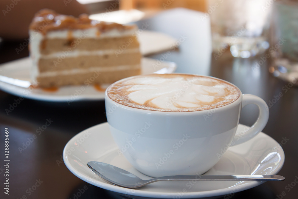 Wall mural Coffee, cappuccino and cake.