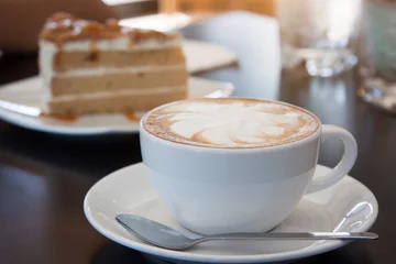 Zelfklevend Fotobehang Koffie, cappuccino en cake. © beerphotographer