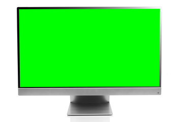 Sleek modern computer display with blank green chroma key screen, front view and isolated on white background with reflection