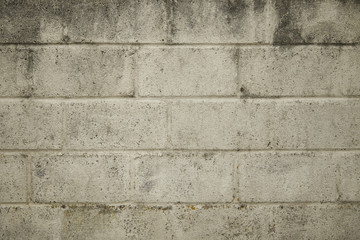 A full page of weathered concrete block wall background texture