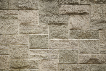 A full page of rough stone wall background texture