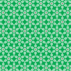 white snowflake pattern on green