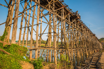 Fototapeta na wymiar Wooden bridge (Mon Bridge) in Sangkhlaburi District, Kanchanabur