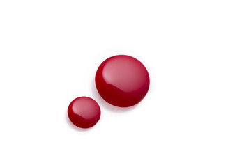 shiny red nail polish spill