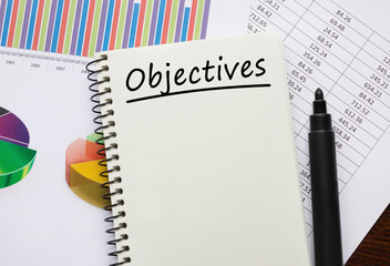 Notebook with Toolls and Notes about Objectives