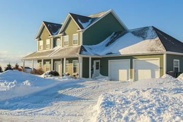 Fototapeta premium Winter home in north American neighborhood.