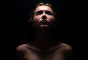Woman's face in shadow