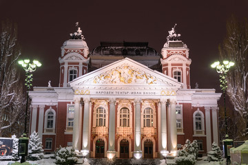Fototapeta na wymiar Cityscape by night at Sofia, Bulgaria - National Theatre building