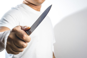 A hand holding knife