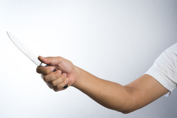 A hand holding knife