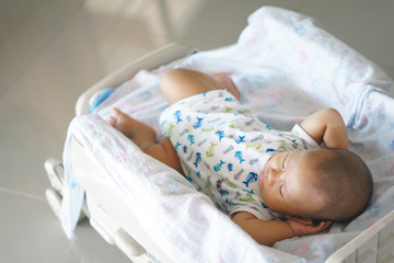 Obraz na płótnie Canvas Sleeping asian baby