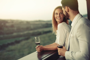 Romantic couple drinking wine