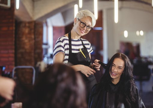 Hairdresser working on the client