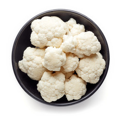 Bowl of cauliflower isolated on white, from above