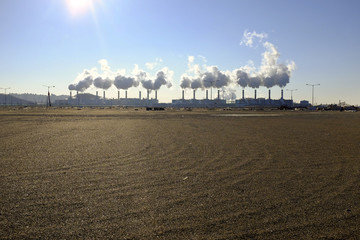 Fototapeta na wymiar Industrial power plant with smokestack