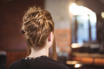 Rear view of woman with updo hairstyle